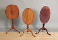 Three tilt top candlestands