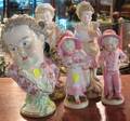 Two Pairs of German Polychrome Decorated Bisque Figures of Children and a Modern Viennastyle Porcelain Portrait Bust
