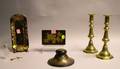 Pair of Brass Pushup Candlesticks Three Gilt Decorated Lacquered Table Articles a Sterlingmounted Cut Glass Scent Vial and a Small