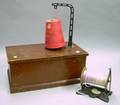 Red Painted Wooden Lidded Document Box and Two Cast Iron Counter Spool Holders