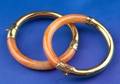 Pair of 14kt Gold and Orange Jadeite Bracelets