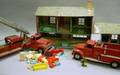 Tonka Toys Painted Steel No 5 Fire Pumper Truck and Ladder Truck and a Lithograph Tin Doll House with Plastic Furniture
