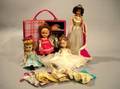 Four Small Plastic Dolls