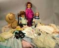 Three Vinyl Dolls Doll Clothes and Doll Arm Chair
