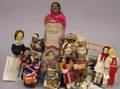 A Group of Eighteen Foreign and American Dolls