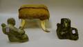 Hide Upholstered and Horn Footstool and Two Eskimo Carved Soapstone Figures