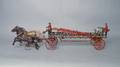 Cast iron horse drawn fire ladder wagon