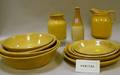 Eighteen Yellowware and Stoneware Table Items