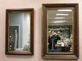Empire Parcelgilt and Mahogany Veneer Ogee Mirror and a Victorian Parcelgilt and Walnut Mirror