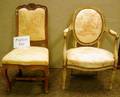Pair of Louis XVI Style Red and White Toile Upholstered Carved and Painted Armchairs and Two Louis XV Style Carved Beechwood Chairs