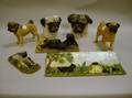 Group of Six Miscellaneous Pug Figures and Heads and a Scenic Plaque