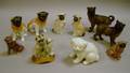 Nine Pottery Pug Figurines and a Figural Group