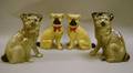 Two Pairs of Glazed Pottery Pug Dogs