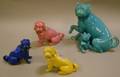 Group of Four Glazed Pug Figurines