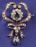 Antique 14kt Gold Sapphire and Diamond Bow Brooch