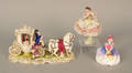 Painted porcelain coaching group together with a German dancer figure and a Royal Doulton figure