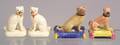 Four Staffordshire Seated Pug Dog Figures
