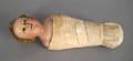 Carved and painted figure of a swaddled infant 19th c
