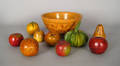 Nine painted redware fruit banks late 19th c
