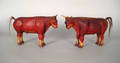 Pair of Pennsylvania carved and painted poplar bull figures 19th c