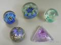 Five Internally Decorated Paperweights