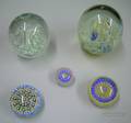 Five Internally Decorated Paperweights