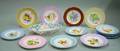 Thirteen Handpainted China Desert Plates and an Open Serving Basket
