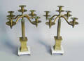 Pair of brass candelabra with marble bases