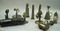 Twelve Early Lighting Related Items in Tin Iron and Brass