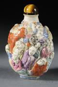 Relief Decorated Porcelain Snuff Bottle