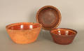 Three redware bowls