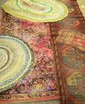 Three Machinemade and Two Braided Rugs