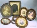 Seven Late Victorian Mostly Oval Walnut Frames and an Oak Frame