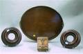 Oval Brassmounted Inlaid Mahogany Serving Tray a Carved Wood ABCFloral Molding Block and a Pair of Circular 