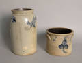 Stoneware crock stamped Lyons with cobalt clover decoration together with another crock