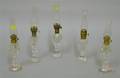 Five Small Colorless Cut Glass Fluid Lamps with Glass Chimneys