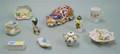 Nine Late Victorian Porcelain and Glass Table Items and a Japanese Imari Sleeping Cat Figure
