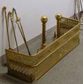 Georgianstyle Pierced Brass Fireplace Fender a Set of Three Brass Tools and a Pair of Brass Balltop Ropetu