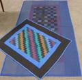 Two Amish Pieced Cotton Geometric Pattern Quilts