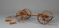 Miniature Walnut and Metal Mounted Cannon and Caisson
