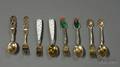 Four Danish Goldwashed Sterling and Enamel Decorated Christmas Fork and Spoon Sets