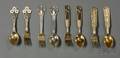 Four Danish Goldwashed Sterling and Enamel Decorated Christmas Fork and Spoon Sets