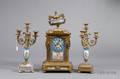 Louis XVI Style Porcelainmounted and Ormolu ThreePiece Clock Garniture