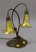 American Deluxe Tiffanystyle Bronzepatinated Lotus Lily Figural Table Lamp with a Pair of Favrilestyle Art Glass Shades