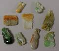 Nine Assorted Carved Jade Pendants and Other Items