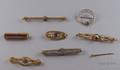 Seven Assorted Art Nouveau and Art Deco Bar Pins