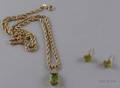 Pair of 14kt Gold and Peridot Earstuds and a Similar Pendant Necklace