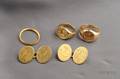 Two 18kt Gold Signet Rings and a Pair of 18kt Gold Cuff Links England