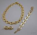 14kt Gold Necklace and Brooch Suite and a Similar Bracelet