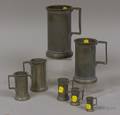 Seven Graduated Pewter Measures